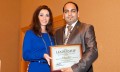 Dr Prem Recieving Leadership Award From Renee-Marie Stephano